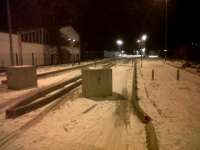 All lit up and nowhere to go: this is the Guided Busway (former Huntingdon line) at the Cambridge end, looking from Milton Road. Despite the lighting, opening is still a few months away - hence the concrete blocks.<br><br>[Ken Strachan 26/12/2010]