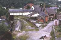 Looking west over Llangollen Station in June 1974, shortly before restoration. It appears in remarkably goodcondition considering that passenger services between Ruabon and BalaJunction had been withdrawn in December 1964, although freight continued to <br>
Llangollen from Ruabon until 1968. [See image 9859]<br>
<br><br>[Bill Jamieson /06/1974]