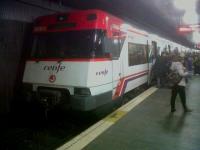 This RENFE Metro train (heading for Tarrasso at Universitat) is pretty large as underground trains go. The broad track gauge combines with squared-off tunnels to enable roomy and stable trains.<br><br>[Ken Strachan 15/12/2010]