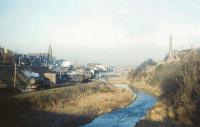 Looking north east along the Eye Water towards Eyemouth harbour on 27 January 1962. The photograph, taken one week before final closure of the branch, shows a J39 0-6-0 (a class which more or less monopolised workings during the final years) shunting the terminus. Eyemouth Parish Church overlooks the scene from Victoria Road. [With thanks to Bill Jamieson]<br>
<br><br>[Frank Spaven Collection (Courtesy David Spaven) 27/01/1962]