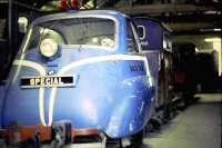 A <i>'Rail Taxi'</i>. Originally an Italian designed, BMW built Isetta bubble-car, this 4-2-0 petrol railcar had been converted for rail operations in 1967 and initially used on the Leighton Buzzard Light Railway. Photographed here during a period on the Ffestiniog Railway in 1984. <br><br>[Gus Carnegie //1984]