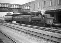 Collett ex-GWR 0-6-0PT no 3758 waits with a train at Swindon on 29 June 1959.<br><br>[Robin Barbour Collection (Courtesy Bruce McCartney) 29/06/1959]