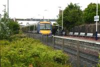 Gone - and largely forgotten? The old station at Bathgate, which <br>
closed in October 2010, was handier for the town centre (it could hardly have been closer) but it was not well appointed. The new station is a big improvement. 170 453 stands at the old one on 17 June 2008, having just arrived from Edinburgh.<br>
<br><br>[David Panton 17/06/2008]