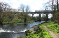 Part of the 15-arch Larbert Viaduct over the River Carron to the south of Larbert station. View east on 26 April 2006 with a northbound service crossing.<br><br>[John Furnevel 26/04/2006]