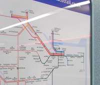 I photographed the previous version of this map [see image 31499] and wondered how ScotRail would cope with A-B reopening. Here's your answer: they cheated a bit (or performed a workaround, as it's called these days). A 'dip' has been created at Bathgate which allows all the station names to be fitted in without having to move the Motherwell to Cumbernauld line nearer to Glasgow with all the squashing and redrawing of other lines that would entail. You can amuse yourselves by looking for other changes. <br><br>[David Panton 04/01/2011]