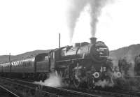 Ivatt 4MT 2-6-0 no 43129 at Rothbury on 9 November 1963 at the head of the <I>The Wansbeck Wanderer</I> about to return south.<br><br>[K A Gray 09/11/1963]