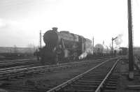 Scene at Upperby around 1964, showing an unidentified Stanier 8F with a down freight heading for Bog Junction or London Road. <br><br>[K A Gray //1964]