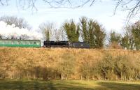 Scene on the Mid Hants Railway on 2 January 2011, showing Black 5 no 45379 heading east on the outskirts of Alresford towards Ropley.<br><br>[Peter Todd 02/01/2011]