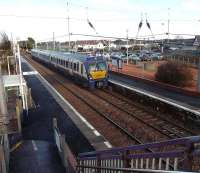 The unique Juniper set with blue ends and roof passes through Barassie at 11.36 on 7 January with the 11.00 from Glasgow Central arriving in Ayr at 11.52.<br><br>[Ken Browne 07/01/2011]