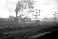 Black 5 no 45353 leaving Blackpool North on Boxing Day 1967 with the 2.30pm to Leeds via Manchester. Photograph taken from Blackpool North shed.<br><br>[Robin Barbour Collection (Courtesy Bruce McCartney) 26/12/1967]