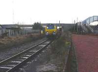 Freightliner 70005 passes Barassie with Killoch to Drax loaded FHH at 12.06 on 7 January 2011.<br><br>[Ken Browne 07/01/2011]