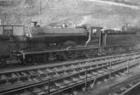 Scott class 4-4-0 no 62425 <I>Ellangowan</I> stands in the shed yard at Hawick, thought to be around 1958, the year the locomotive was withdrawn by BR.<br><br>[Robin Barbour Collection (Courtesy Bruce McCartney) //1958]