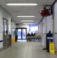 <I>Would patrons kindly remain seated throughout the performance.</I> The ticket hall at Rutherglen station with its unusual double row of seats offering a fine view of the platforms - and the M74 bridge.  <br>
<br>
<br><br>[David Panton 04/01/2010]