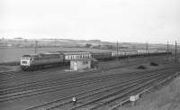 Class 47 no 1521 arriving at Filey Holiday Camp station with train 1L43, the 07.35 Sheffield - Scarborough, on Saturday 15th August 1970.<br>
<br><br>[Bill Jamieson 15/08/1970]