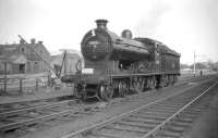 An impressive looking <I>Glen Falloch</I> photographed during the stop at Selkirk with the BLS <I>Scott Country Railtour</I> on 4 April 1959. The locomotive was withdrawn from St Margarets the following March and cut up at Connels of Calder some four months later. Note the child being lifted from the pram to admire 62471.<br><br>[Robin Barbour Collection (Courtesy Bruce McCartney) 04/04/1959]