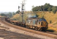 Class 37 no 6772 drifts down towards South Pelaw Junction with a load ofrolled steel plate from Consett to Tyne Yard on 20 August 1971.<br><br>[Bill Jamieson 20/08/1971]