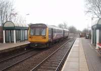 A New Year's Day service from Colne to Blackpool South calls at Church and Oswaldtwistle. Just round the bend 142004 will cross the Leeds and Liverpool canal and then run alongside it to the next stop at Rishton.<br><br>[Mark Bartlett 01/01/2011]