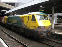 Virgin Trains is currently using a Freightliner Class 90, no 90045, to power its loco hauled set (previously a DBS class 90). The loco is seen here at Euston on 14 January at the head of the 10.43 service to Birmingham New Street.<br><br>[Michael Gibb 14/01/2011]