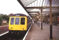 A DMU for Barrow at Ulverston in July 1987.<br><br>[Ian Dinmore /07/1987]