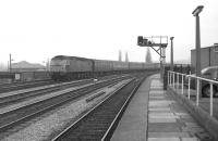 A class 47 arrives at Newport with a westbound service on a very dull day in early March 1986.<br>
<br><br>[John McIntyre /03/1986]