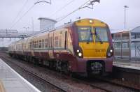 334 001 waits at a wet Bathgate Station on 15 January 2011 with the 16.01 to Edinburgh waverley.<br>
<br><br>[Bill Roberton 15/01/2011]