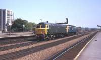 47500 in lined brunswick green and named <I>Great Western</I>, heads west through Reading in May 1985 hauling a second class 47 in rail blue livery.<br>
<br><br>[John McIntyre /05/1985]