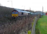 66238 stands at Riccarton Oil Terminal, Kilmarnock, on 17 January 2011 about to return empties on train 6D61, the 10.22 to Grangemouth.<br><br>[Ken Browne 17/01/2011]