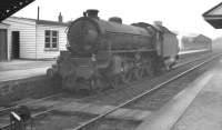 B1 no 61242 <I>Alexander Reith Gray</I> running south wrong-line through Kittybrewster station in September 1960. The locomotive is thought to be on its way from Kittybrewster shed (the top of the coaling plant can be seen above the tender) to Aberdeen station to pick up a train. From the ground signal the locomotive appears to be clear to use the crossover behind the camera.<br><br>[K A Gray 06/09/1960]