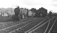 Stanier 8F 2-8-0 no 48077 photographed in the shed yard at Kingmoor.<br><br>[Robin Barbour Collection (Courtesy Bruce McCartney) //]