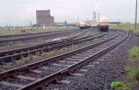 Part of Leith South Yard (lines 19 to 23) with ICI tanks in 1988. At this time the old part of the yard to the right and the former Caledonian yard site, further right, had not been redeveloped. View towards Leith docks.<br><br>[Ewan Crawford //1988]