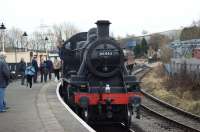 On the sweeping platform at Heywood, the present eastern terminus of <br>
the East Lancashire Railway, Ivatt 2-6-0 no. 46443 backs onto the train before heading back to Rawtenstall.<br><br>[John McIntyre 23/01/2011]