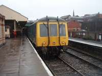 Gloucester RC&W <I>bubble car</I> W55001 at Bury Bolton Street on a Heywood bound New Year's Day 2011 ELR service. It is not widely known that sister unit M55019 was used experimentally on the Rawtenstall branch around 1970. However, whilst it proved more than adequate for Monday to Friday services, it could not cope with Saturday loadings and services reverted to the Cravens and Derby twin power car sets. M55019 then went into departmental service as DB975042 and was regularly seen in the North West on route learning duties. It is now stored at Aylesbury as Sandite unit 960 015. W55001 betrays its own departmental route learning service as there is no bulkhead between the brake section and the drivers compartment. <br><br>[Mark Bartlett 01/01/2011]