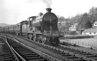 The SLS/MLS <I>'Carlisle Railtour'</I> about to leave Langholm to return to Carlisle on 6 April 1963 behind preserved ex-North British 4-4-0 no 256 <I>Glen Douglas</I>.<br><br>[K A Gray 06/04/1963]