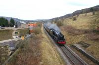 Black 5 no 44871 approaches the former station of Ewood Bridge as <br>
it heads south from Rawtenstall towards Bury on the East Lancashire Railway on 23 January 2011. The remains of the southbound platform can still be clearly seen on the right just in front of the locomotive.<br>
<br><br>[John McIntyre 23/01/2011]