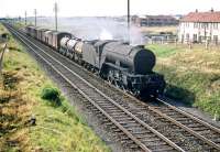 The longest name? V2 no 60835 <I>The Green Howard, Alexandra, Princess of Wales's Own Yorkshire Regiment</I> brings a freight down from the Forth Bridge towards Saughton Junction on 25 July 1959.<br><br>[A Snapper (Courtesy Bruce McCartney) 25/07/1959]