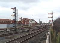 Semaphores out of use. Blackpool North No.1 signal box closed recently leaving just No.2, seen here, and then Carleton Crossing controlling the line to Poulton-le-Fylde. The semaphore distants here have large crosses on the arms indicating they are not in use as the home signal(s) they protect are also out of use. View towards Blackpool carriage sidings from a point alongside the end of Blackpool North platforms. [See image 34138]  <br><br>[Mark Bartlett 27/01/2011]