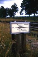 The ground frame at Alness in 1974, showing the goods yard sidings (still open) and the closed Dalmore distillery siding.<br><br>[David Spaven //1974]