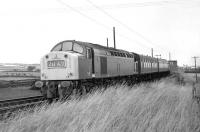 Summer Saturday arrival at Filey Holiday Camp on 15 August 1970. Class 40 no 396 is about to  enter the station at 11.18 with local train 2H62, following the short 23 minute journey down the Yorkshire coast from its starting point at Scarborough. The train will leave 42 minutes later forming the 12.00 to London Kings Cross.<br>
<br><br>[Bill Jamieson 15/08/1970]