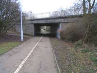 The Leslie branch remained open for goods until 1967, long enough for much of Glenrothes New Town to be built round it and for the line to be bridged (briefly) by new roads.� This is the realigned A92 of the mid-1960s, seen here in January 2011.� It is the same road and bridge seen (under construction?) in the background of an earlier Railscot photograph [see image 27713] though viewed from the other side.�Laverock Avenue is therefore to my left.� <br><br>[David Panton 29/01/2011]