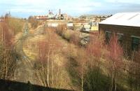 View north along the trackbed of the Waverley Route in 2001 with Lady Victoria Colliery (Scottish Mining Museum) in the background and the former locomotive shed on the right.<br>
<br><br>[Bill Roberton //2001]