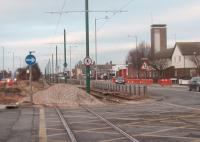 Still a bit of work to do. Scenes like this can be seen along the full length of the Blackpool and Fleetwood tramway as refurbishment and renewal work continues. This is the site of a planned 'Stanley Road' tram stop, looking towards Broadwater and Blackpool. <I>Then and Now</I> comparisons to follow in due course as the line is reopened. <br><br>[Mark Bartlett 27/01/2011]