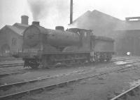 Class J36 no 65285 in the shed yard at 65B Balornock Shed on 4 March 1963. This is one of the modified examples of the class with cut down cab and boiler fittings, for use on the Gartsherrie branch.<br><br>[K A Gray 04/03/1963]