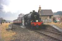 42737 with the SLS <I>Scottish Rambler No 3</I> railtour at Broughton on 29 March 1964. Following this stop the special returned along the branch to Symington [See image 22588]<br><br>[Andy Carr Collection 29/03/1964]