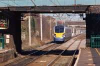 Looking north towards Farington Junction from Platform 2 at Leyland on 3 February as a Northern service formed by unit 180108 heads towards Preston.<br><br>[John McIntyre 03/02/2011]