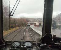 Rawtenstall, as seen from a departing DMU service for Bury and Heywood. This was a through station until 1966 and the two wagons are standing just about at the point where <I>Cam</I> Camwell captured a Bacup bound push pull service in 1951. [See image 21209]<br><br>[Mark Bartlett 01/01/2011]