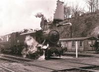 GWR 0-6-0PT no 1501 departing from Bewdley on the Severn Valley Railway in April 2001.<br><br>[Peter Todd 18/04/2001]