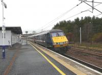 82228+91112 with the 1E15 Glasgow Central-London Kings Cross passing through Carstairs station on 5 February.<br><br>[Ken Browne 05/02/2011]