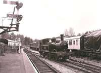 GWR 0-4-2T no 1420 running round at Buckfastleigh on the South Devon Railway on 8th April 2001.<br><br>[Peter Todd 08/04/2001]