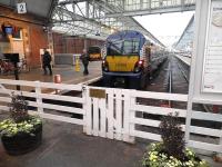 View out from the concourse at Helensburgh Central on 9 February with a blue class 334 at the buffer stops on platform 2.<br><br>[John Yellowlees 09/02/2011]