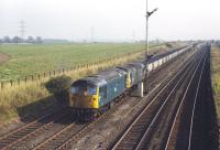 5303+5304 approaching Niddrie West Junction on 13 October 1970 with MGR coal empties from Cockenzie power station returning to Fife. The train is using the direct route from Monktonhall Junction on the ECML via Wanton Walls. In the right background class 50 no 414 is approaching from Niddrie South Junction on its way back to Polmadie, having deposited its Holborough bound cement empties in Millerhill yard [see image 32389].<br>
<br><br>[Bill Jamieson 13/10/1970]